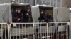 Dozens Detained In Nationwide Anti-Putin Protests In Russia