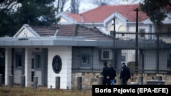 Montenegrin police guard the entrance to the U.S. Embassy compound in Podgorica on February 22.