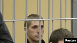 One of the condemned men, Uladzislau Kavalyou, in the dock during the Minsk trial