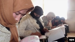 Afghan girls take a university admission test in Kunduz. Women now make up 30 percent of university students in Afghanistan