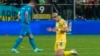 Ukraine's Mykhailo Mudryk (right) celebrates at the end of his country's victorious Euro 2024 playoff against Greece on March 26. 