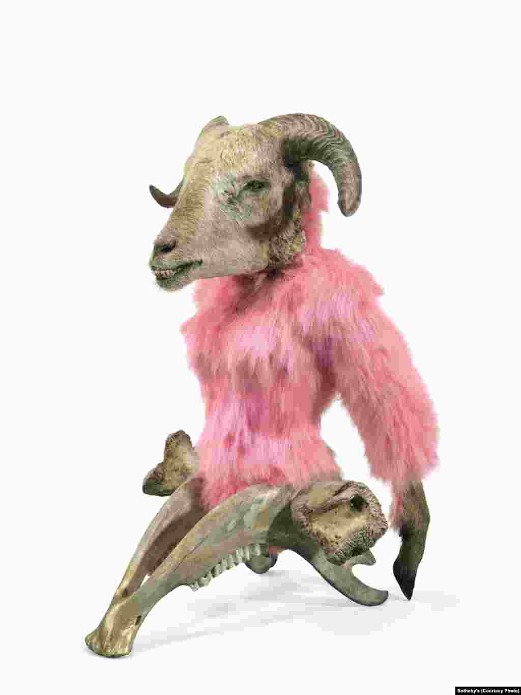 &ldquo;Glamour Genetics,&rdquo; a 2012 piece by Azerbaijani artist Mahmud Rustamov (b. 1967). The work incorporates a sheep&rsquo;s head, goat feet, a cow&rsquo;s lower jaw and thigh bone, and synthetic fur.