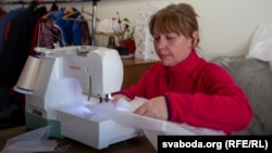 A volunteer in the western Belarusian city of Hrodna sews masks and protective equipment to help doctors during the coronavirus pandemic. 