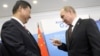 Kremlin Calm As China's Clout Rises In Russia's Backyard