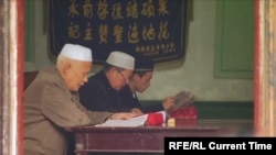 Ethnic Kazakhs pray in a mosque in the Xinjiang Uyghur Autonomous Region. 