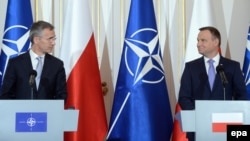 Polish President Andrzej Duda (right) and NATO Secretary-General Jens Stoltenberg (file photo)