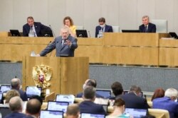 Vladimir Zhirinovsky addresses the State Duma in Moscow on July 9.