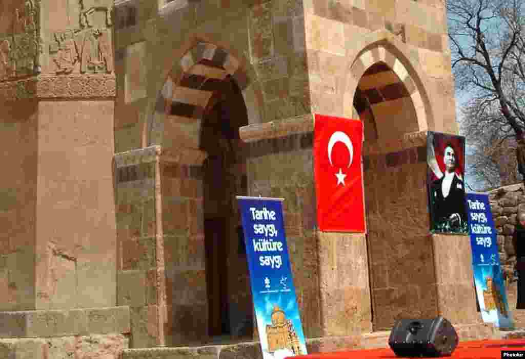 A Turkish flag and a picture of Turkish leader Mustafa Kemal Ataturk at the entrance to the church during a ceremony marking the end of its renovation in 2007.