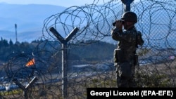 A Macedonian soldier patrols the country's border with Greece in September 2019.