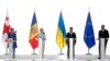 (Left to right) Georgian President Salome Zurabishvili, Moldovan President Maia Sandu, Ukrainian President Volodymyr Zelenskiy, and European Council President Charles Michel address a conference during a summit in Georgia's Black Sea city of Batumi in July 2021.