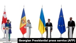 (Left to right) Georgian President Salome Zurabishvili, Moldovan President Maia Sandu, Ukrainian President Volodymyr Zelenskiy, and European Council President Charles Michel address a conference during a summit in Georgia's Black Sea city of Batumi in July 2021.