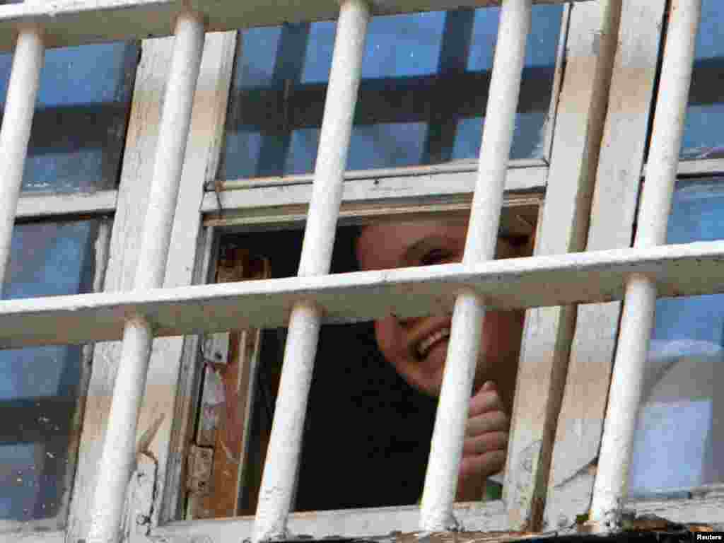 Yulia Tymoshenko looks out through a prison window in Kyiv in November 2011.