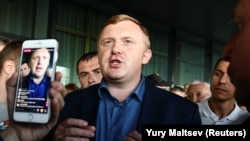 Communist Party candidate Andrei Ishchenko meets with supporters during a rally following the election for governor of Primorye in Vladivostok on September 17.