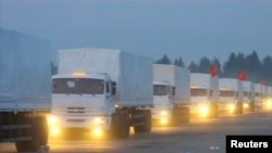 A Russian convoy of trucks said to be carrying humanitarian aid for Ukraine sets off from near Moscow on August 12.