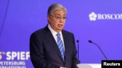 Kazakh President Qasym-Zhomart Toqaev delivers a speech during a session of the St. Petersburg International Economic Forum in St. Petersburg on June 17.