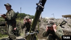 Artillery practice at Ingur frontier post, where Russian border guards have been deployed to defend Abkhazia's border with Georgia