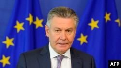 European Commissioner for Trade Karel De Gucht speaks to the press following a trilateral meeting between the EU, Russia, and Ukraine on the implementation of the EU-Ukraine Association Agreement in Brussels on September 12. 