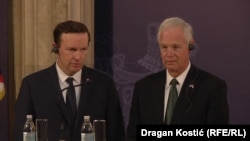 U.S. Senators Chris Murphy (left) and Ron Johnson hold a press conference in Belgrade after meeting with Serbian President Aleksandar Vucic on September 6.