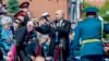 Russian President Vladimir Putin (center) attends the military parade on Red Square in Moscow for the Victory Day celebration in 2020.