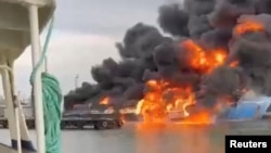 A photo shared on social media showing a blaze at the port of Kavkaz on August 22.