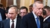 Russian President Vladimir Putin (left) and Turkish President Recep Tayyip Erdogan: The newly assertive role of Turkey in the South Caucasus is a daunting factor in a region that the Kremlin clearly still considers Russia’s backyard.