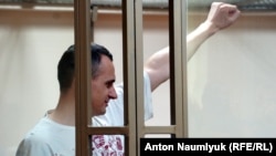 Ukrainian film director Oleh Sentsov is serving a 20-year sentence in a Russian prison after being convicted of plotting terrorist attacks in a trial supporters called absurd.