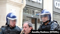 Riot police broke up the April 2 protest in downtown Baku.