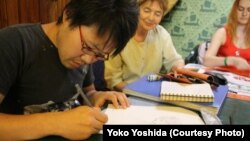 The Japanese Embassy in Minsk would only tell RFE/RL that it was taking "all necessary and possible measures" to free artist Daichi Yoshida, shown here in an undated photo.