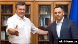 The former Ukrainian parliamentarian who disclosed the personal information, Andriy Portnov (right), used to serve as chief of staff to ex-President Viktor Yanukovych (left). 