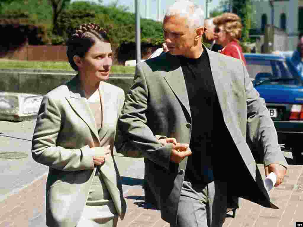 Yulia Tymoshenko walks with her husband, Oleksandr, in Kyiv in 2004.