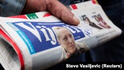 The front page of the independent daily Vijesti shows a photograph of reporter Olivera Lakic, who was shot outside her apartment in the capital, Podgorica, on May 8.