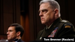 U.S. Chairman of the Joint Chiefs of Staff General Mark Milley (right) testifies beside Defense Secretary Mark Esper before a congressional committee on March 4.