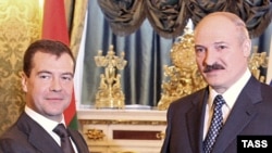 The EU is worried that Belarusian President Alyaksandr Lukashenka (right) arrives in Prague as a proxy of Russia and President Dmitry Medvedev.