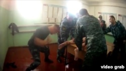 The video was made public after the release of another video in July showing inmates being beaten by guards at a prison in the Yaroslavl region. 