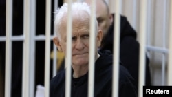 Ales Byalyatski attends a court hearing in Minsk in January 2023.