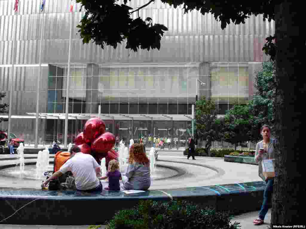 World Trade Center 7, completed in 2004, was the first new building to open. A work by sculptor Jeff Koons stands in the building&#39;s plaza. 