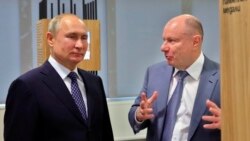 Russian President Vladimir Putin (left) with metals magnate Vladimir Potanin (file photo)