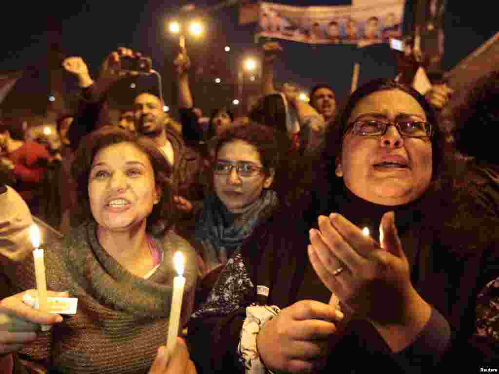 Protesters celebrate in Tahrir Square after the announcement of Mubarak's resignation is announced.