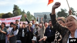 United Kyrgyzstan supporters rally today outside parliament.