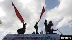 Protesters shouted anti-government slogans during a demonstration at Taksim Square in central Istanbul on June 4, 2013.