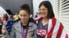 Georgia-born U.S. Paralympic swimmer Elizabeth Stone (left) with her adoptive mother, Linda, at the London 2012 Games.