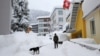 Heavy snowfall has arrived on the eve of the World Economic Forum in Davos, Switzerland.