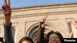 Prominent human rights activist Shirin Ebadi (left) joins an opposition protest in Yerevan.