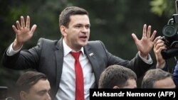 Russian opposition politician Ilya Yashin gestures as he speaks during a rally against efforts to stop opposition candidates from registering for elections to the Moscow City Duma in central Moscow on July 15.