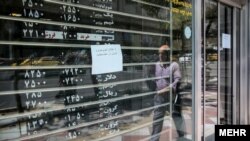 The decision comes amid a plunging national currency that has lost about half of its value in past weeks following a decision in May by U.S. President Donald Trump to leave the 2015 nuclear deal with Iran and reimpose tough sanctions.