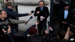 U.S. Ambassador to Hungary David Pressman addresses the media after the parliamentary session ended without a vote in Budapest on February 5.