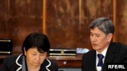 Social Democrat Almazbek Atambaev, seen here with President Roza Otunbaeva in April, would head the government that emerged from the purported deal.