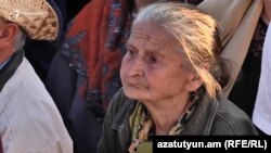 "Grandma Leyla" (Vranouhie Gevorgyan) attends a protest rally in Yerevan in April 2018.