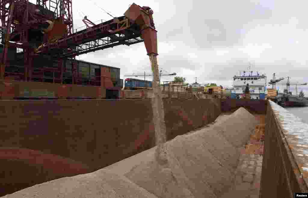 Waste from a potash mine is loaded at a port in Solikamsk in Russia's Perm region.