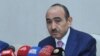 Azerbaijan Arrests Suspect In Police Slayings, Cracks Down On Protests